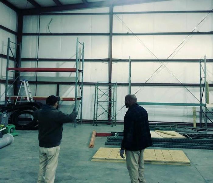 Installing shelving in new warehouse