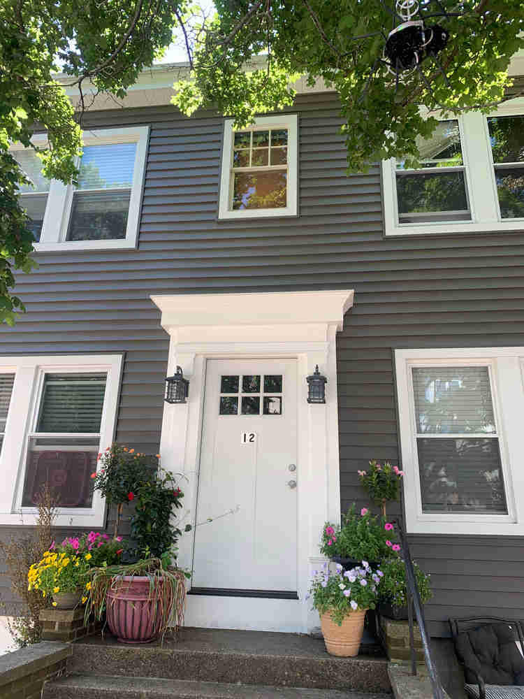 For this exterior remodeling project in Salem, MA, we installed a new front door, new siding, as well as a new fascia and soffit.
