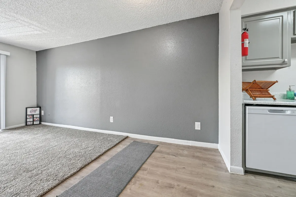 Spacious living room with wood flooring 