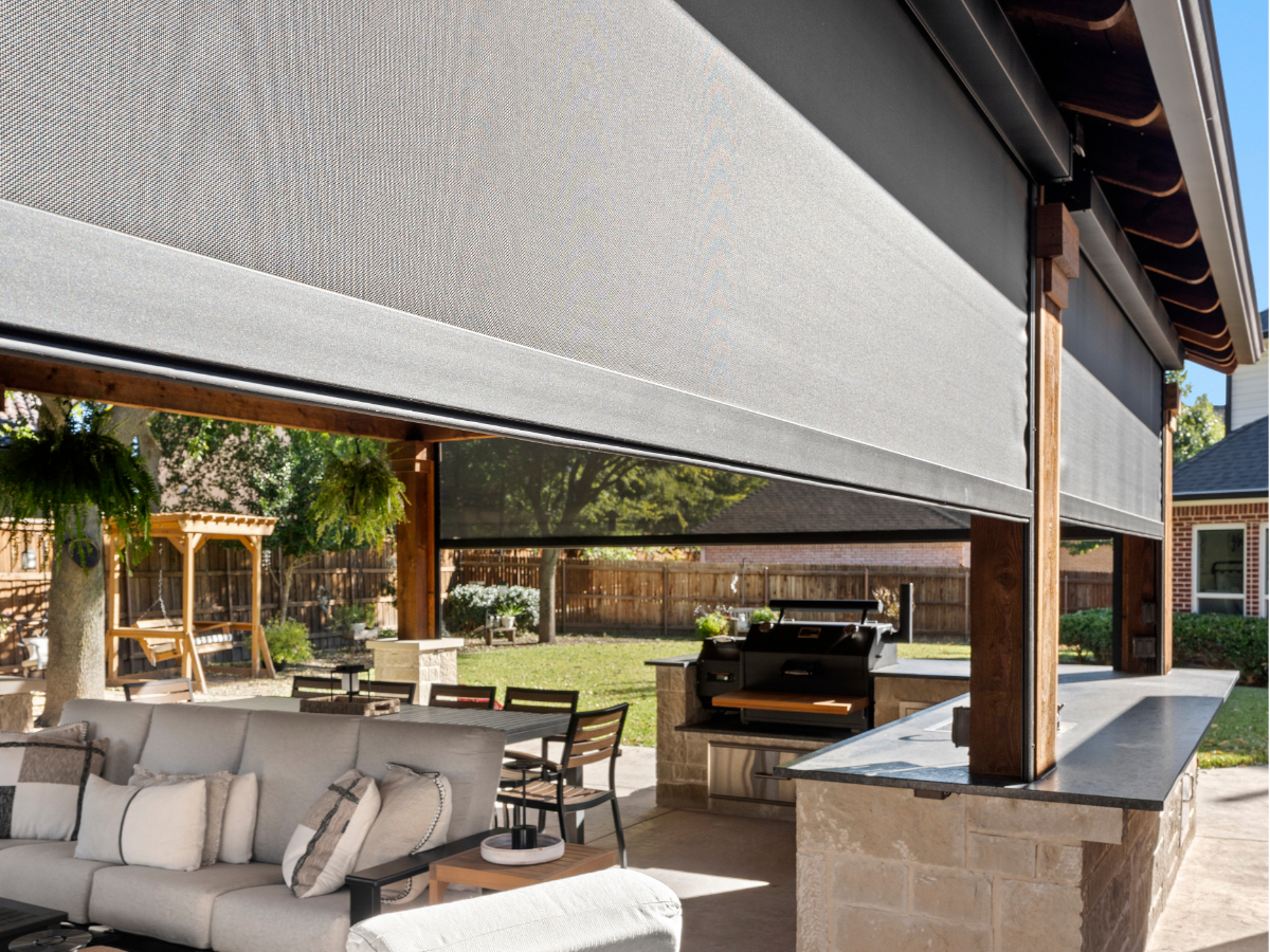 Exterior Shades add comfortable light control to this Manitowoc County backyard patio, helping homeowners enjoy time outside even during bright lakeshore afternoons. Custom fit for the space, they create a more usable outdoor area while maintaining the open feel of the yard.