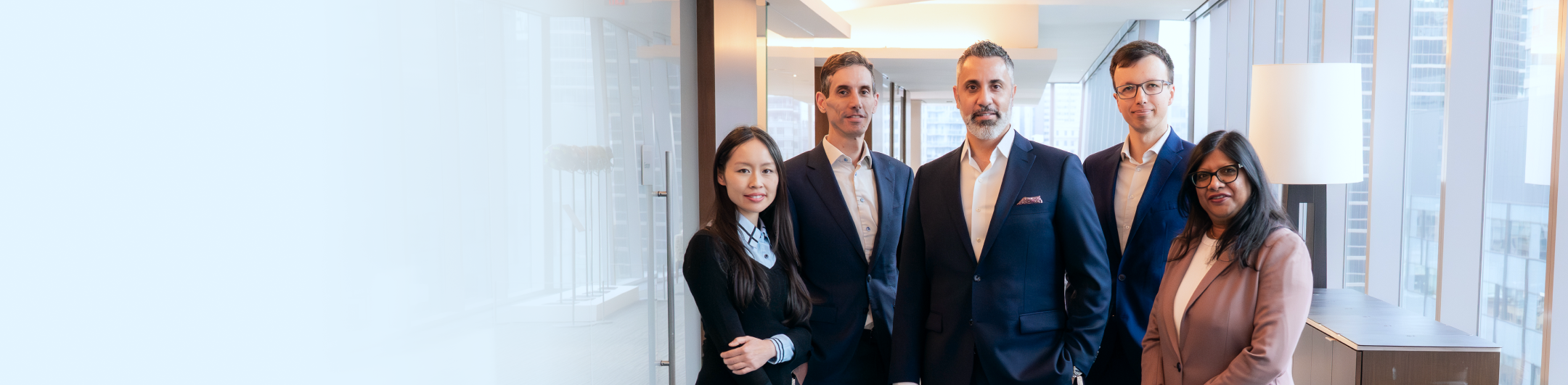 The Galluzzo Private Wealth team in an office building.