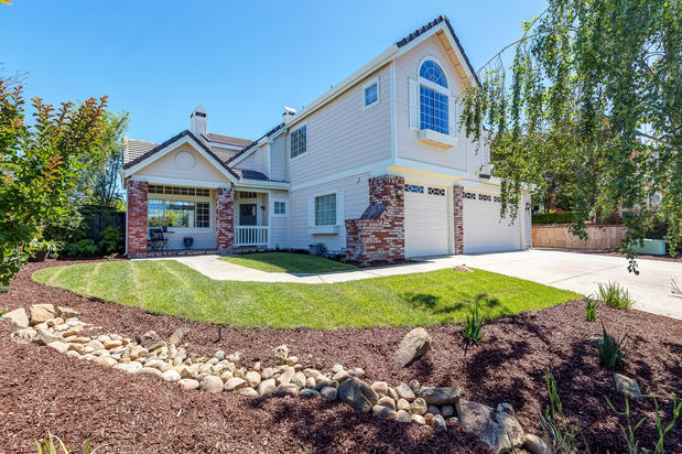 Images Amber Hom Realm Real Estate
