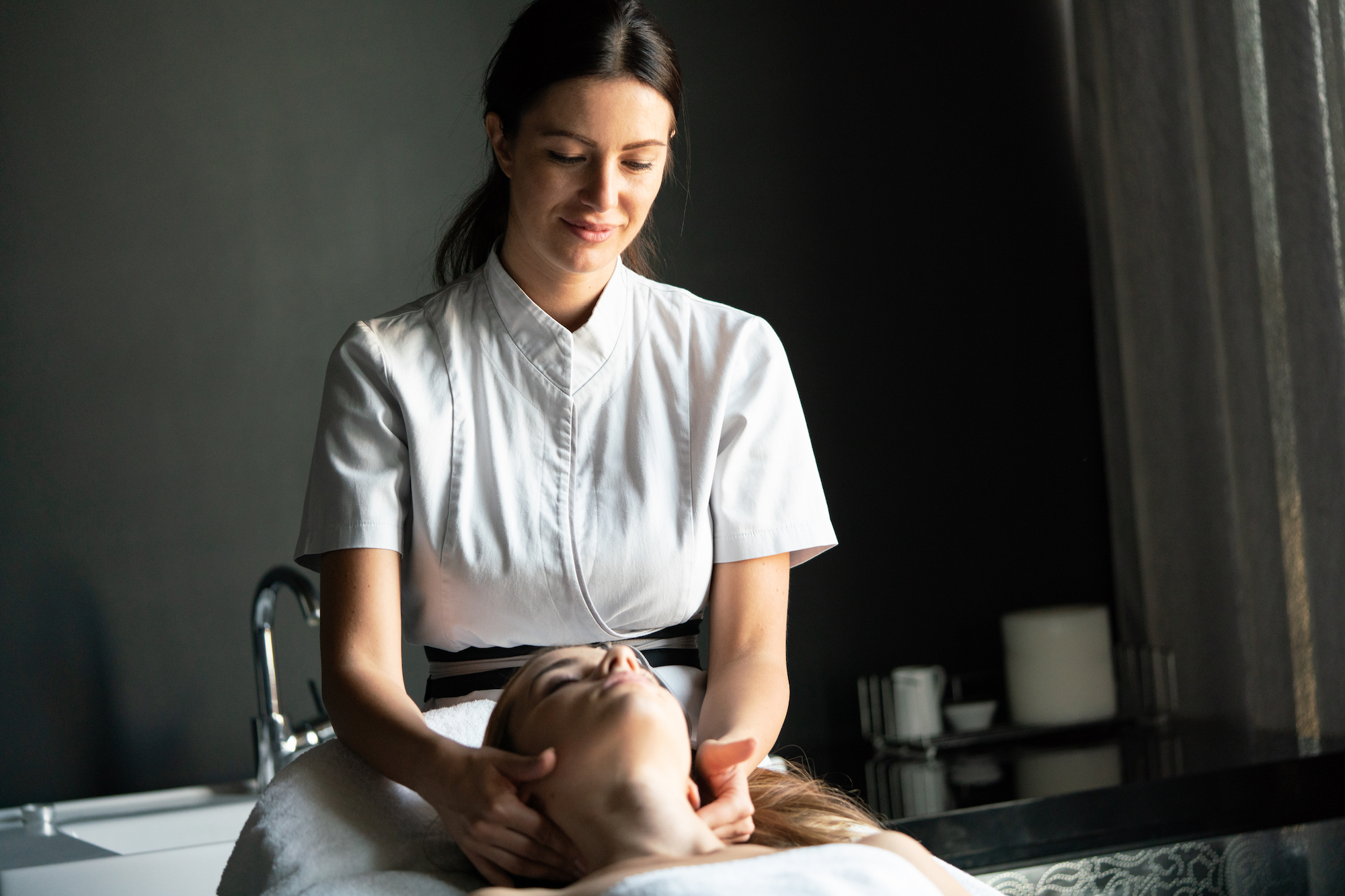 Patient during Massage therapy in Logan