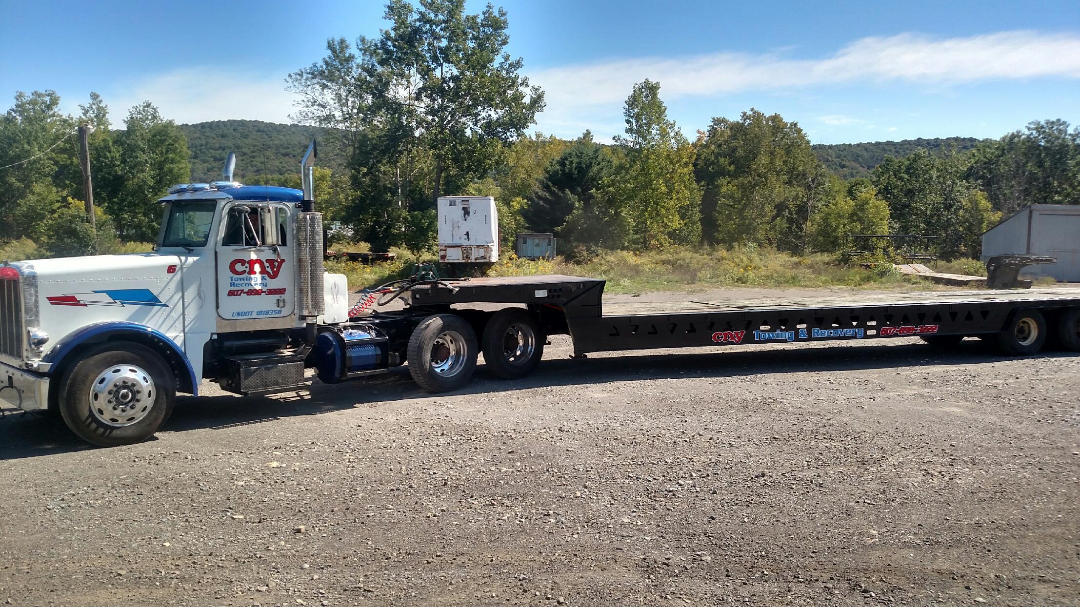 CNY Towing & Recovery is Cortland's trusted provider for light, medium, and heavy duty towing. If you find yourself stranded on the side of the road or stuck in a ditch call us immediately at 607-898-3222. Our tow truck operators are highly trained and certified to ensure your vehicle is in good hands. We treat your vehicle the way you treat it - with care and respect. 

For the most competitive rates for towing in the state call CNY Towing & Recovery. We always give our customers a realistic time of arrival and ETA. We will always be honest and fair with you. If you're in need of a jump start, tire change, battery change, fuel delivery, or winch out you can count on us. We are capable of towing everything from your personal compact vehicle to semis and RV's. We will get you back on the road in no time!

Our well maintained fleet of wreckers, flat beds, military trucks, and standard light duty recovery vehicles can handle any job big or small. Call us today at 607-898-3222.