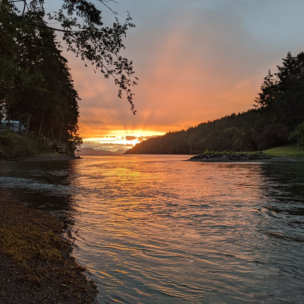 Scenic body of water at sunset.