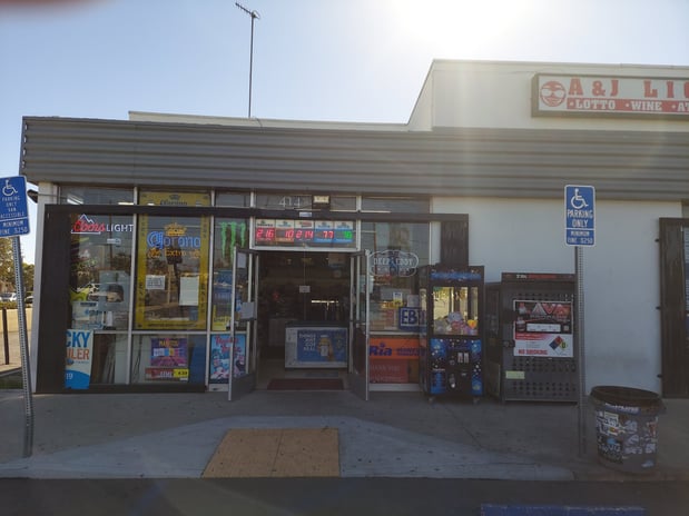 Images CoinFlip Bitcoin ATM - A&J Happy Liquor (Orange)