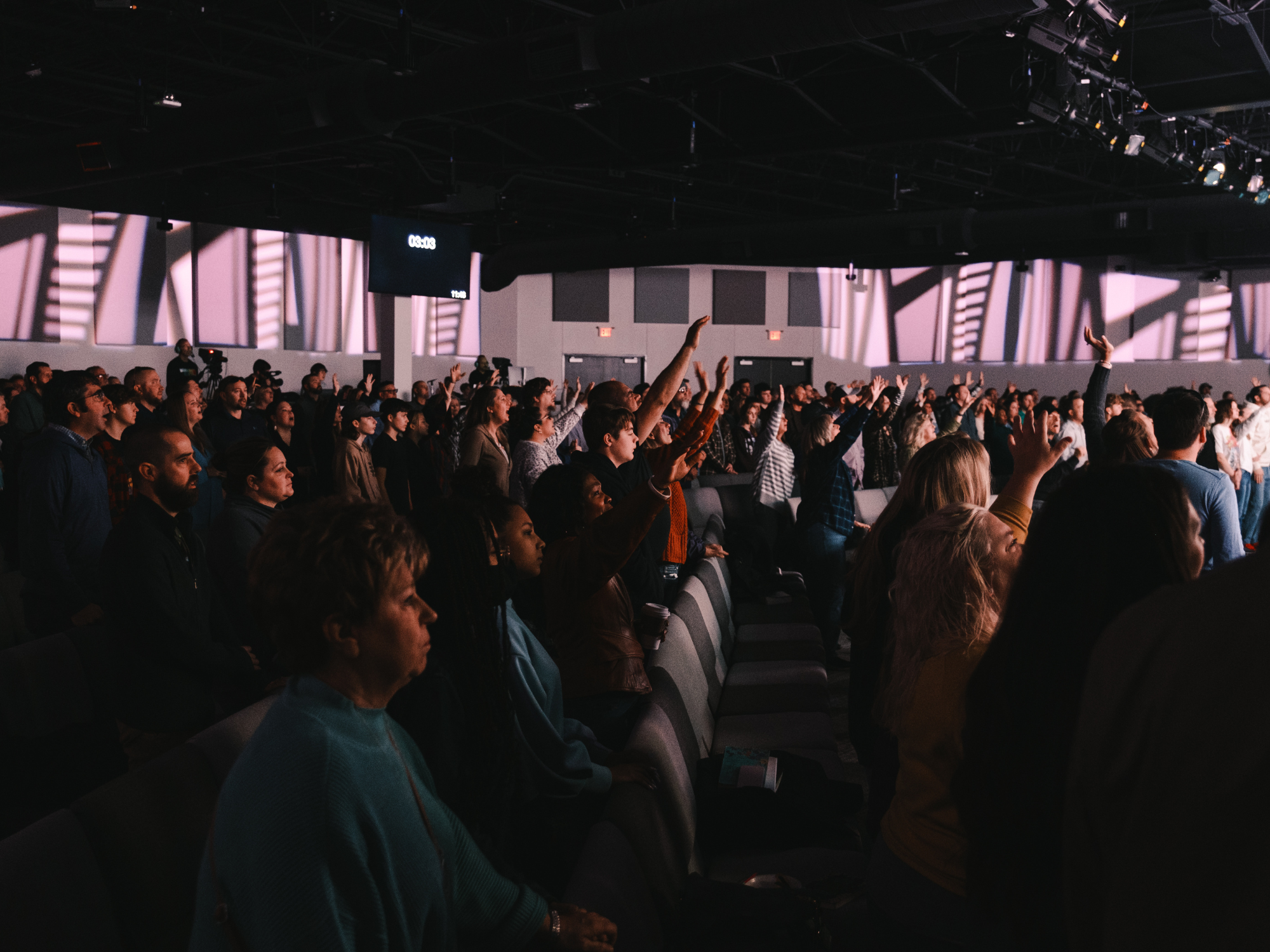 Large crowd worshipping at Church on the Move in Broken Arrow, Oklahoma