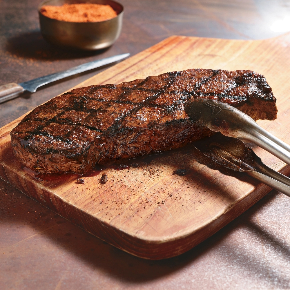 LongHorn's New York Strip is fire-grilled to enhance its distinctive flavor, this thick cut is a steakhouse classic.