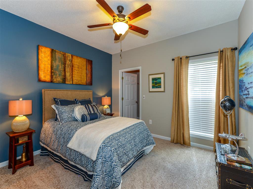 Master Bedroom Feels Large and Spacious with Impressive 9 Foot Ceilings and Large Walk-In Closets at Sugarloaf Crossing Apartments