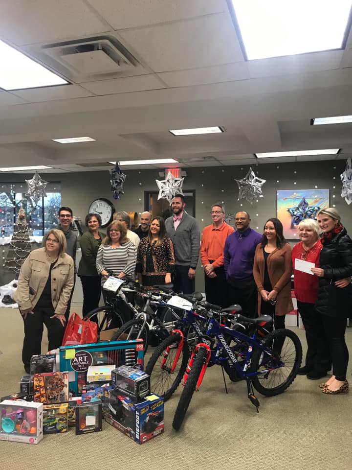 Title One, Inc. team at a charity event.