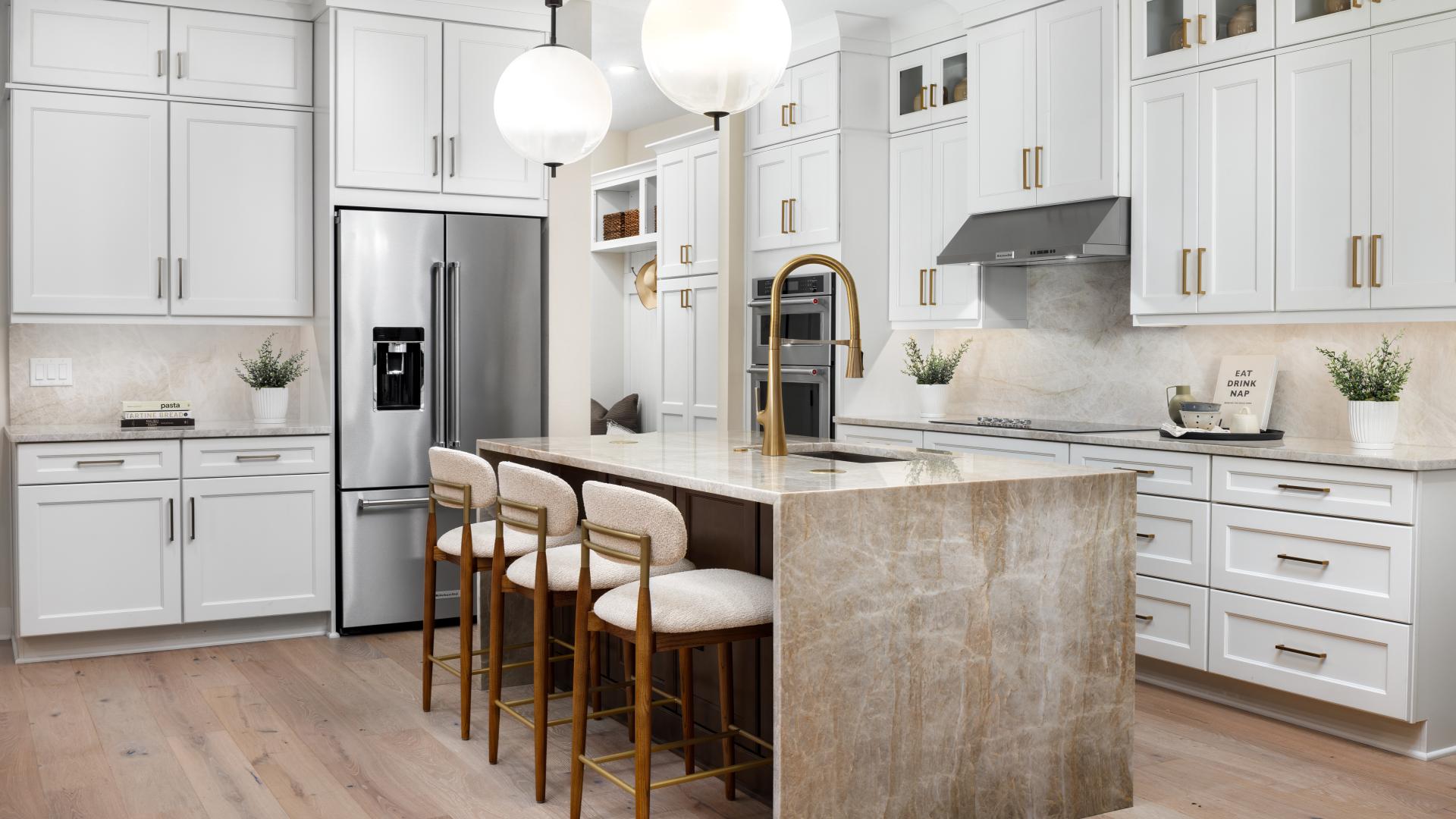 Open-concept, gourmet kitchens with large center islands 