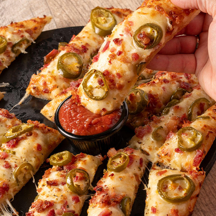 It's our new Loaded Cheese Stix. It's a new twist on an old favorite! Pizza Ranch Worthington (507)376-3711