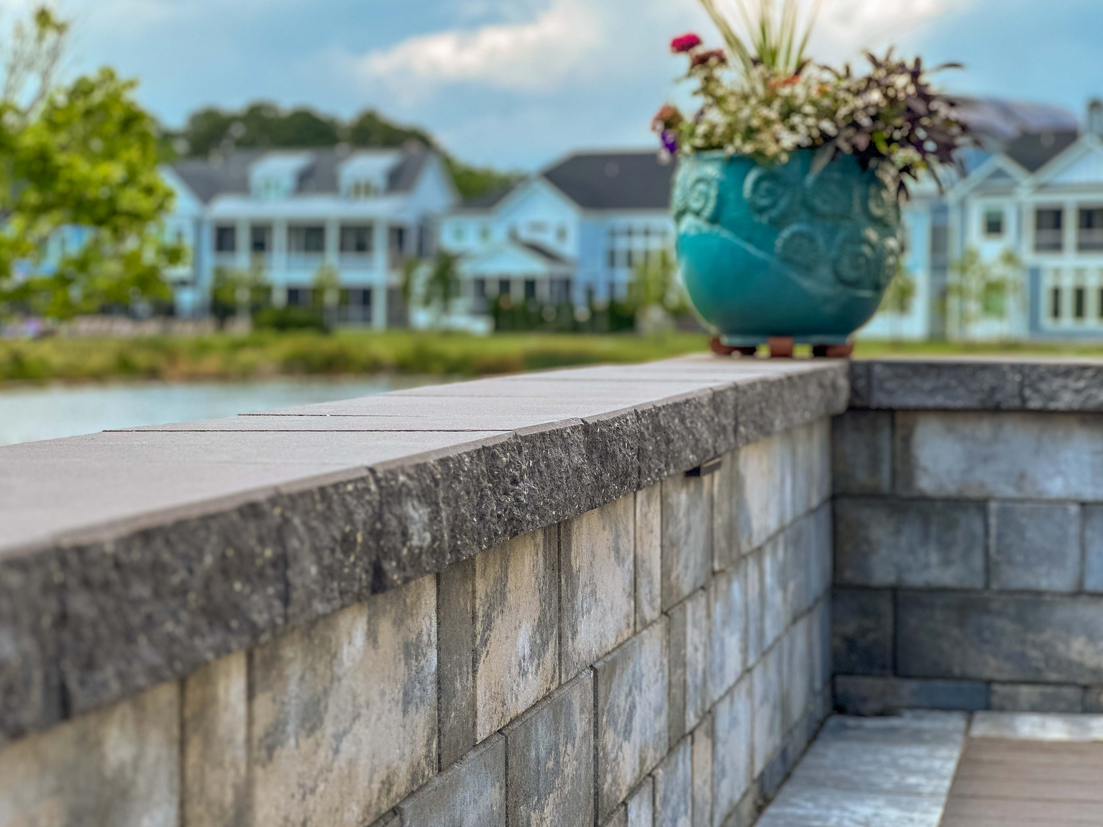 Elevate your outdoor living with stunning paver patios, inviting outdoor lounging spaces, and cozy fire pits. Discover the perfect blend of style and functionality for your backyard oasis with our expert hardscaping services.