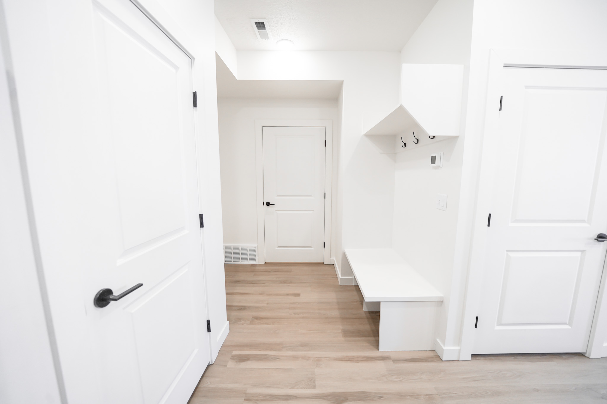 The Springs at Coyote Ridge Apartment entryway bench