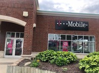 Exterior photo of T-Mobile Store at W. Grand River Ave & Cross Street, Brighton, MI
