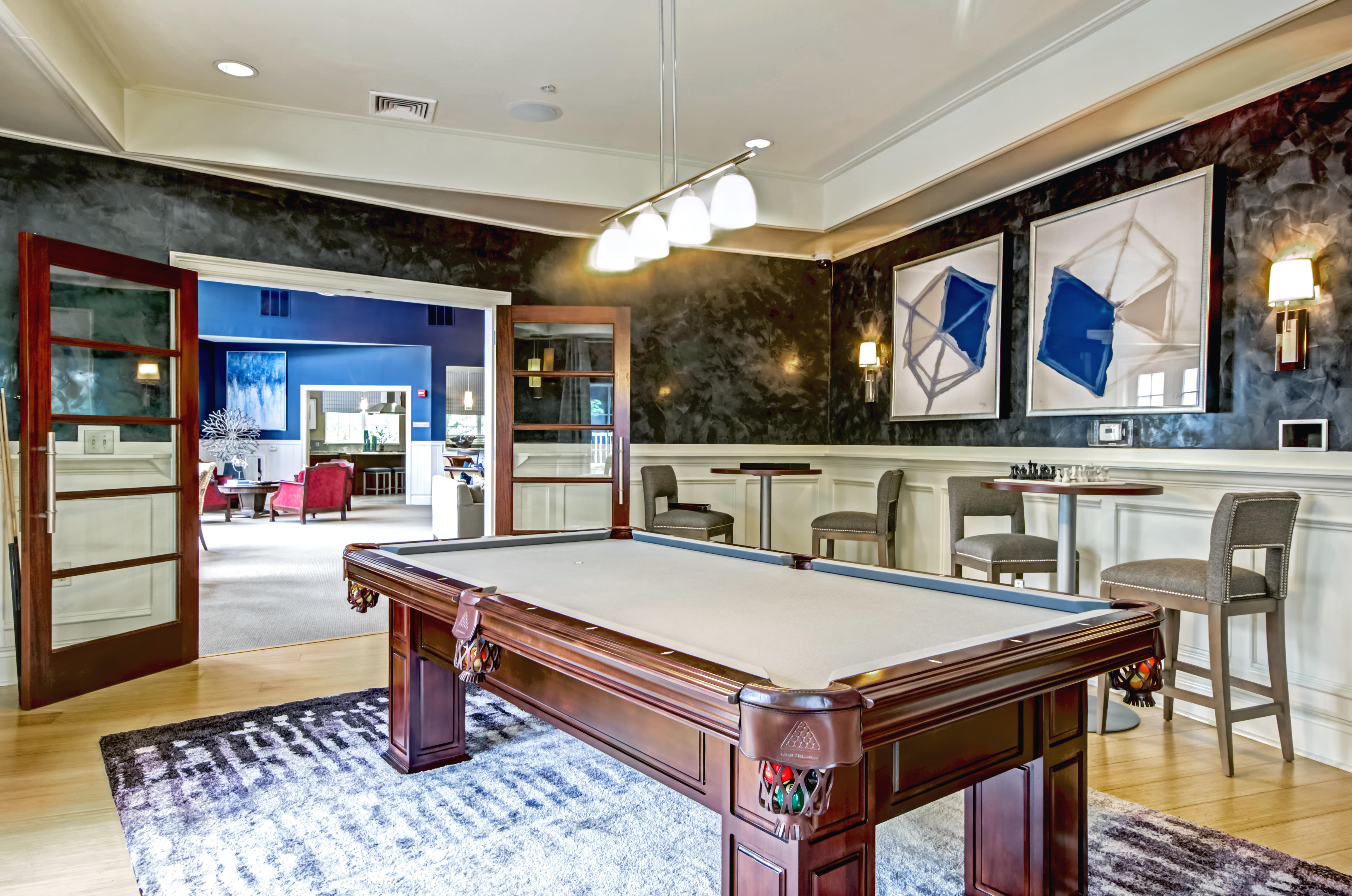 Enjoy a game of pool in our billiards game room