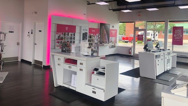Interior photo of T-Mobile Store at W. Grand River Ave & Cross Street, Brighton, MI
