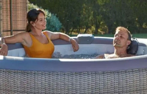 A man and a woman relaxing in a spa