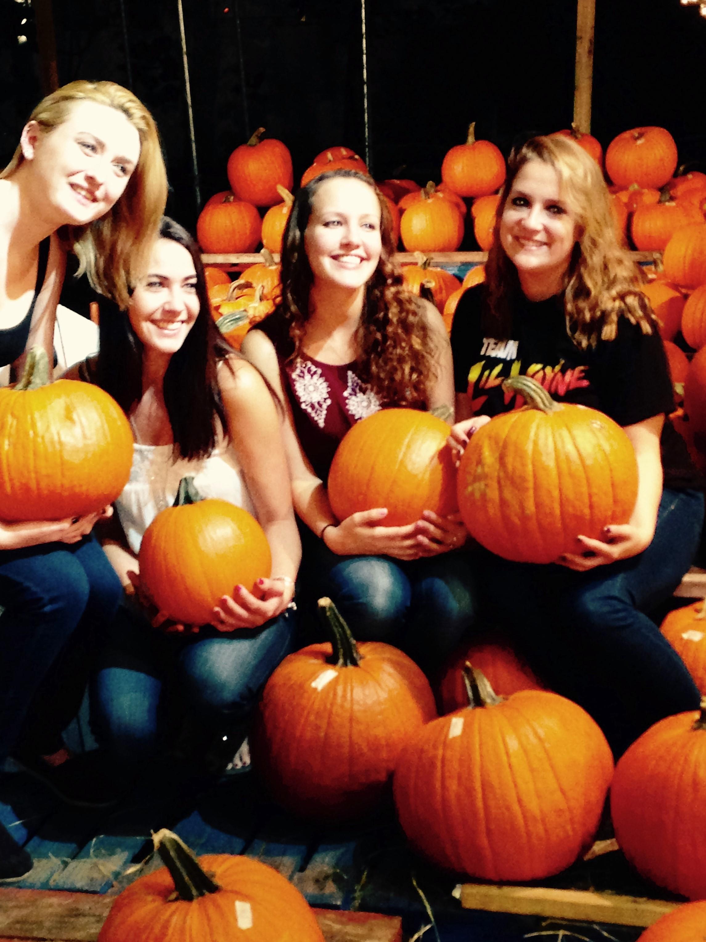 Young-girls-in-pumpkin-patch