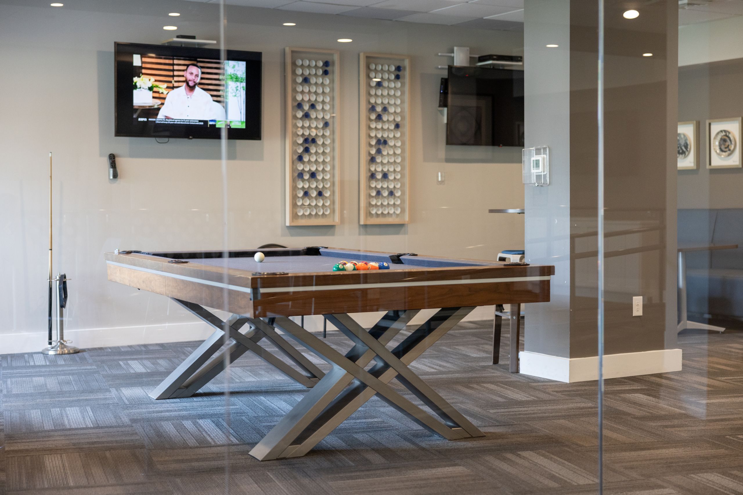 A pool table in a room 