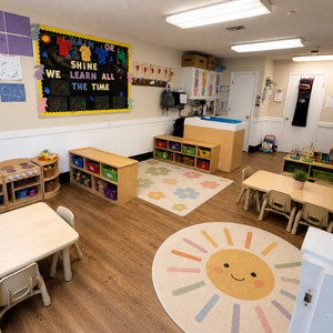 Bright and colorful preschool classroom at Childcare Network with age-appropriate learning materials