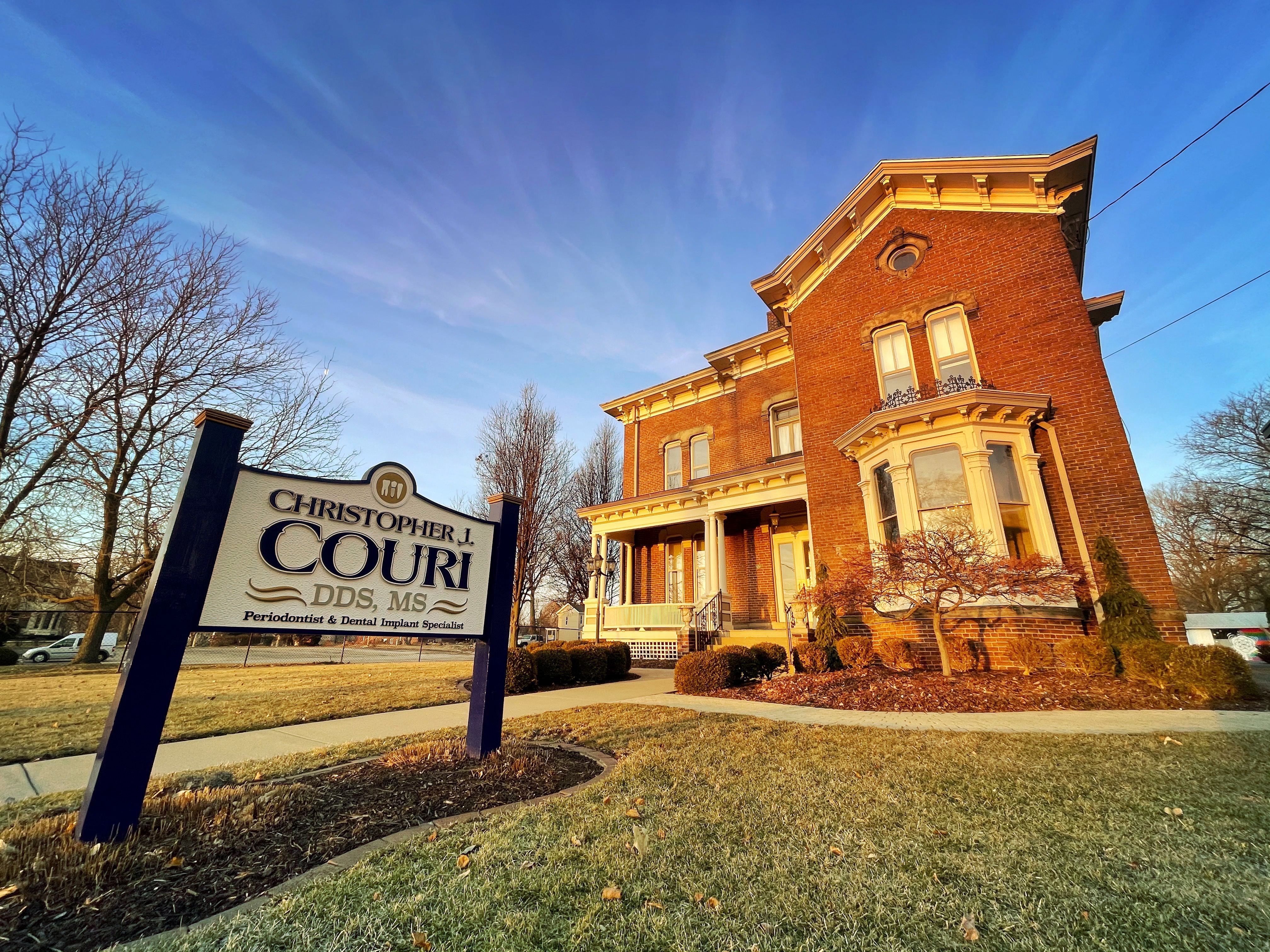 Christopher J. Couri, DDS, MS is one of the leading periodontal practices in the Peoria, IL area. Dr. Couri’s patient focused practice is centered on prevention and treatment delivered with the latest technology.
Our periodontal practice offers the following state-of-the-art techniques, including digital and 3D imaging, laser periodontal therapy, gum disease treatment, scaling and root planing, periodontal plastic surgery, dental implants, LANAP and the pinhole technique.
The office is located in a beautifully maintained Victorian house located at the top of Main Street hill in Peoria, IL, visit us today!