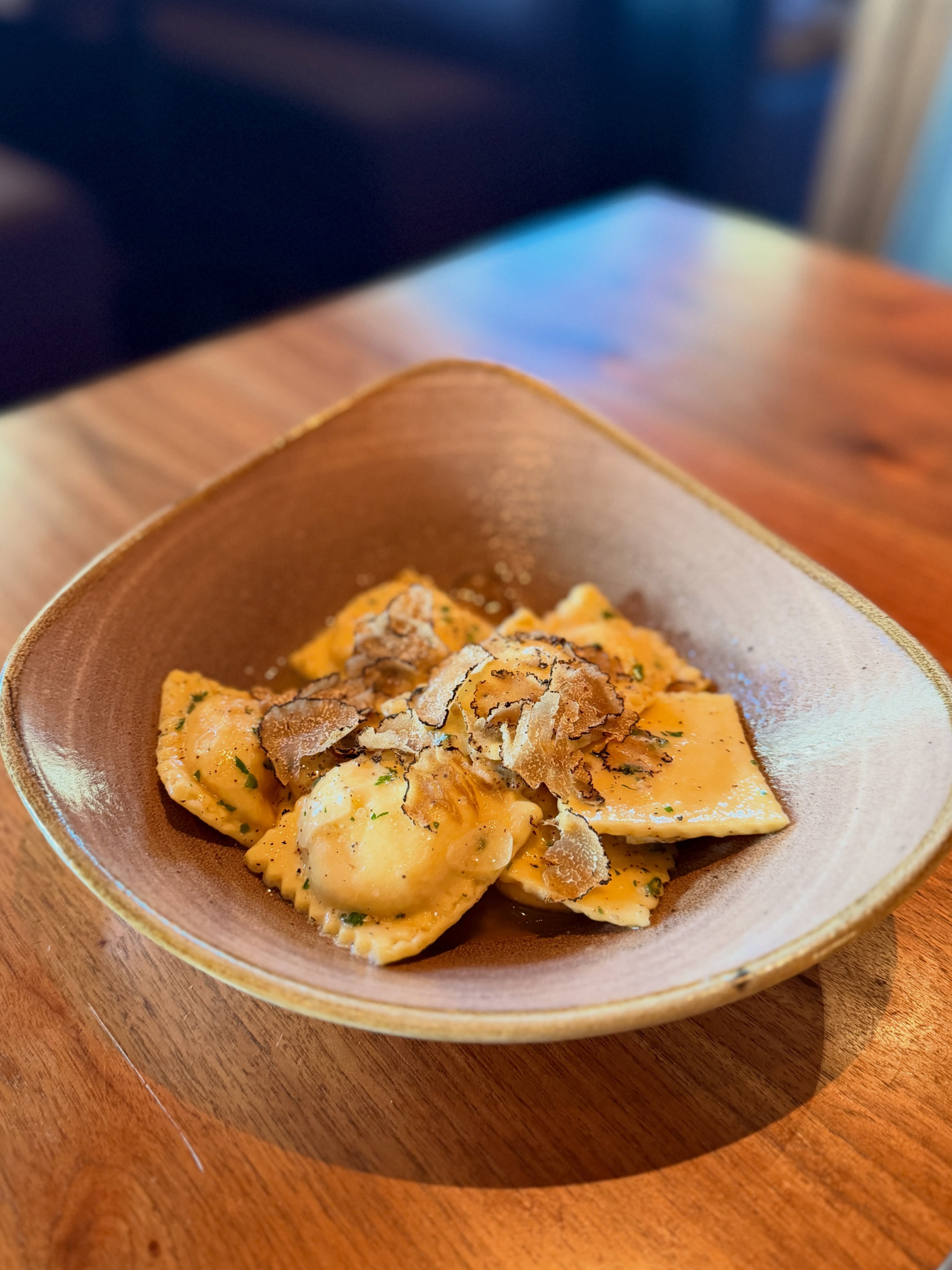 Meet the newest reason to order pasta: Black Truffle & Mushroom Ravioli. 

Local mushroom-stuffed pasta layered with lemon ricotta, handmade mozzarella, butter Parmigiano sauce, Italian parsley, and black truffles imported from Sicily.

Rich, earthy, and made for savoring every bite.
Reserve your table and try it while it&rsquo;s new!