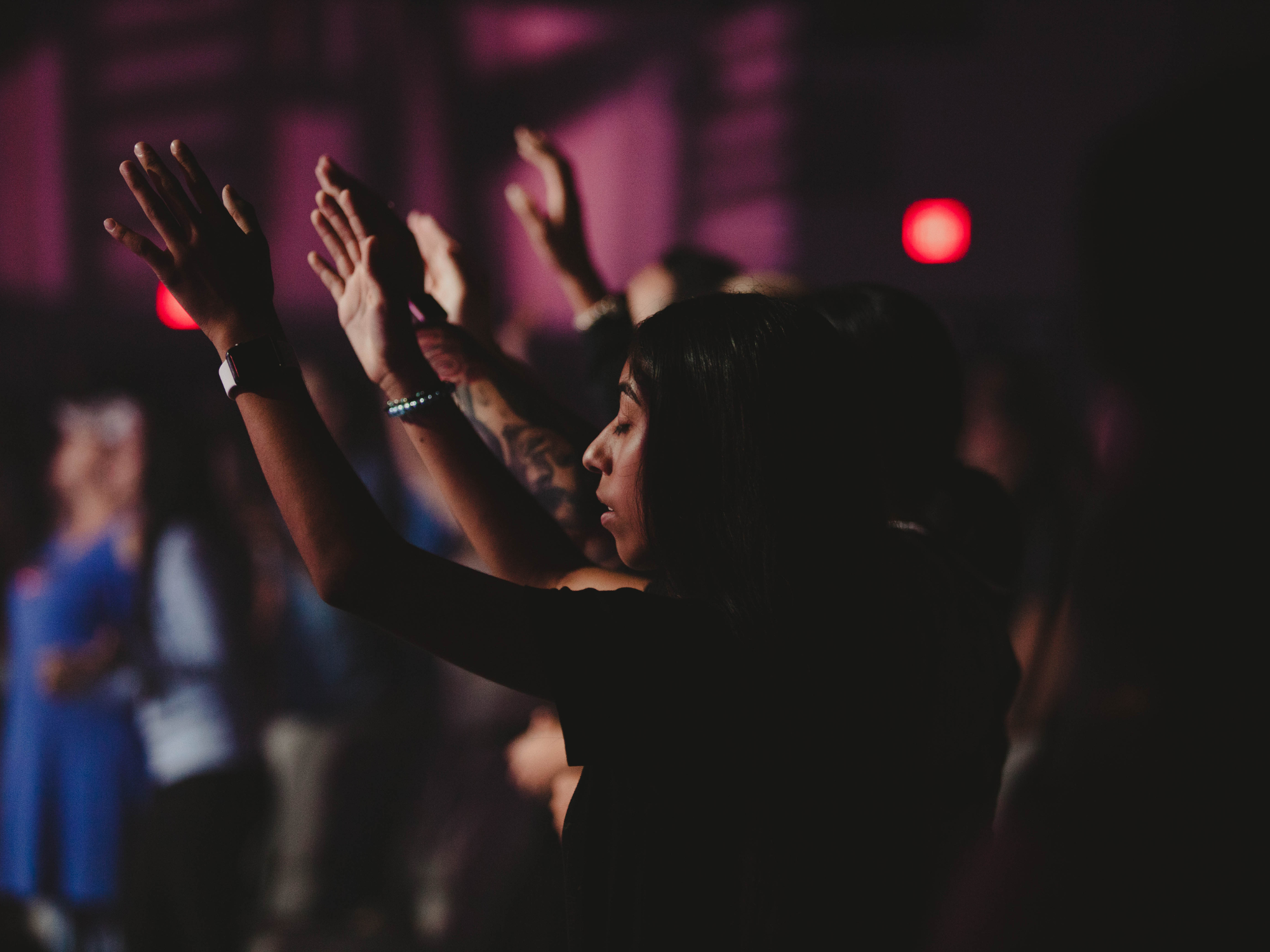 Person worshipping at Church on the Move in Broken Arrow, Oklahoma