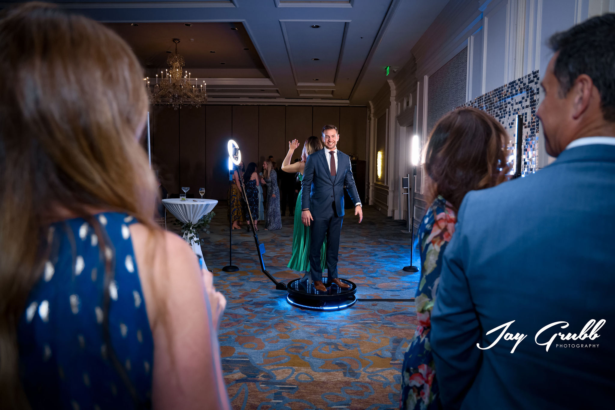wedding guests having fun on 360 Photo Booth 