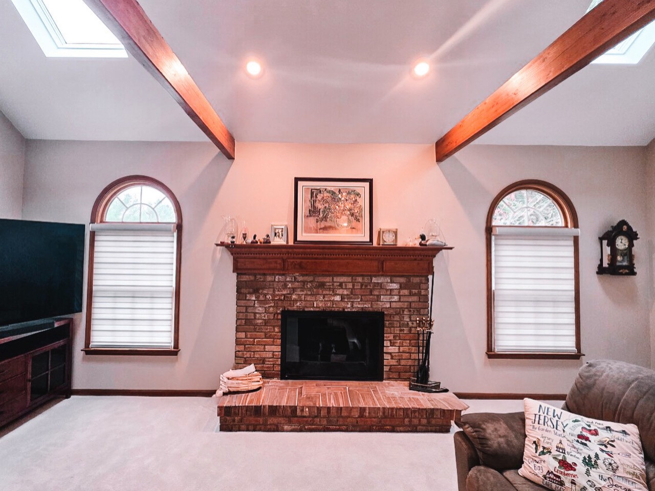 Sheer Shades compliment every window style - even arched windows! Light in, privacy on for this cozy living room in Morganville, NJ.
