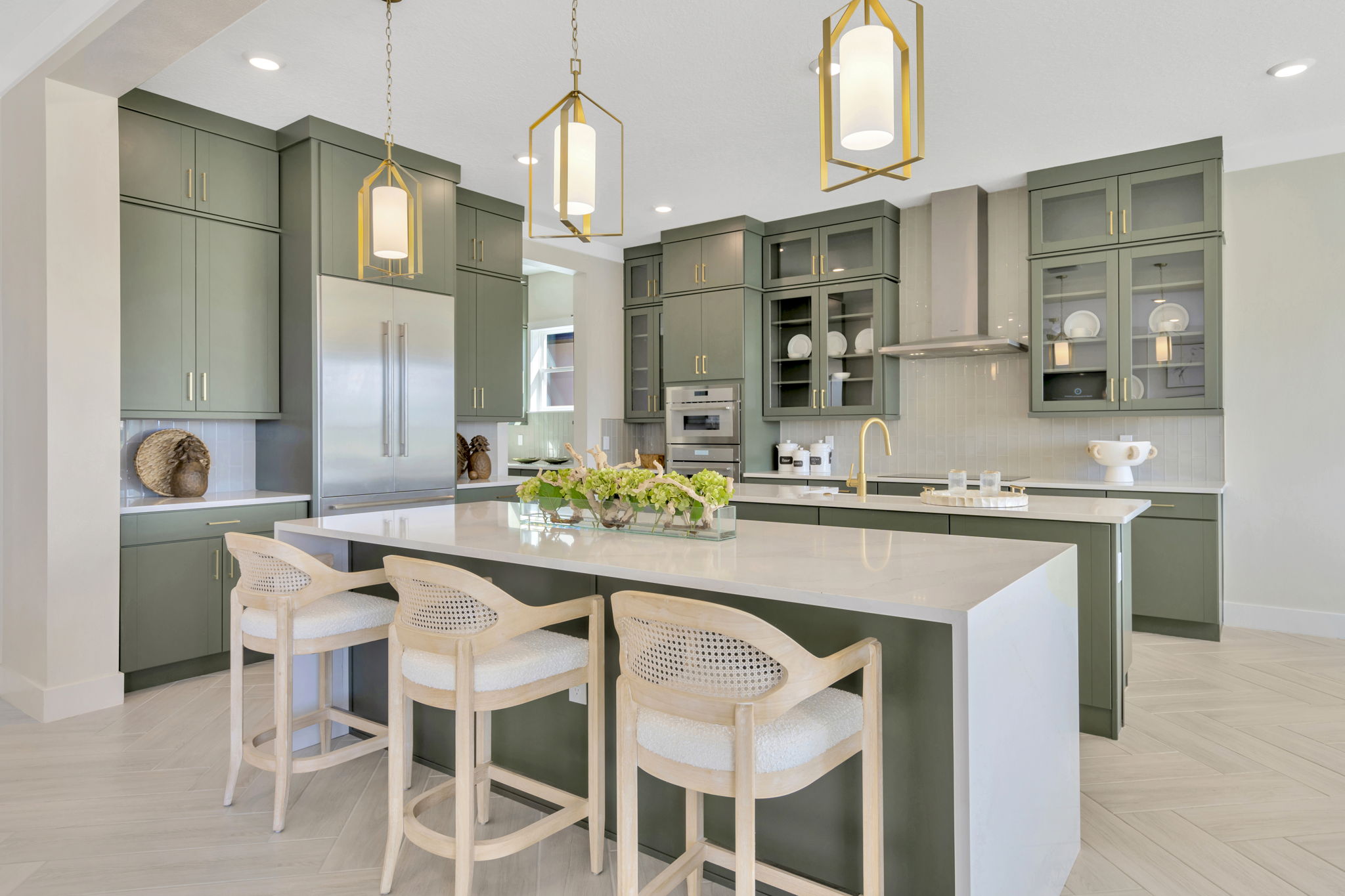 The Kitchen of a DRB Homes Sabal Home Plan at Biscayne Landing at Seaire in Parrish, FL.