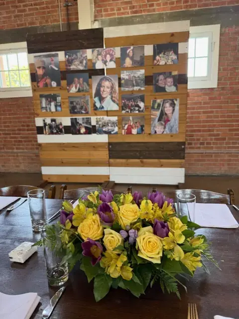 Intimate tribute lighting and memory display at a memorial service