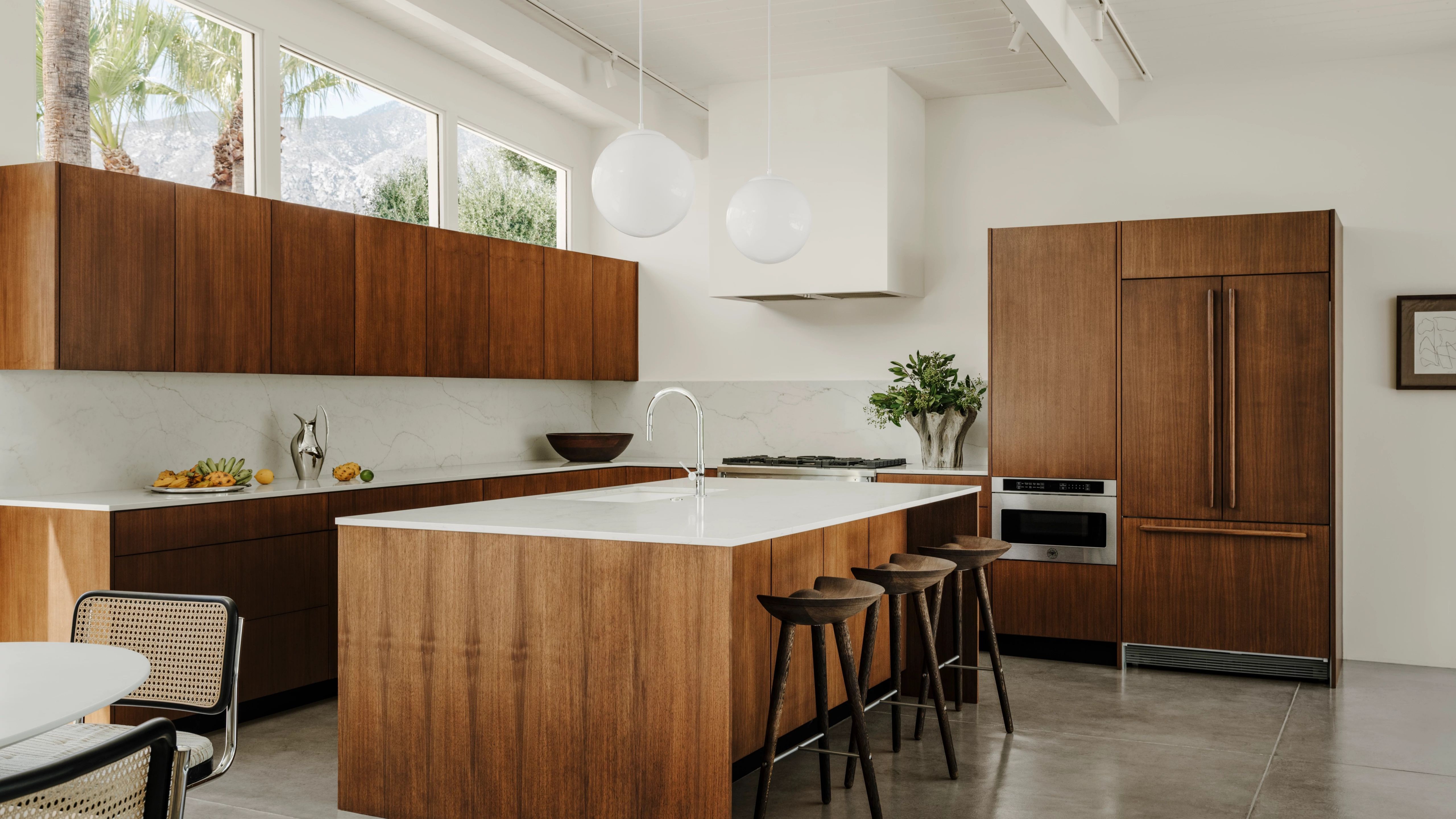 Citrine is creamy white quartz with variegated grey and brownish-gold veining. Its background is characterized by an additional, understated grey pattern, adding more dimension and a realistic marbled effect to the overall look.