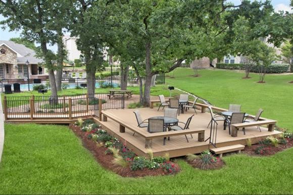 Outdoor patio with green space