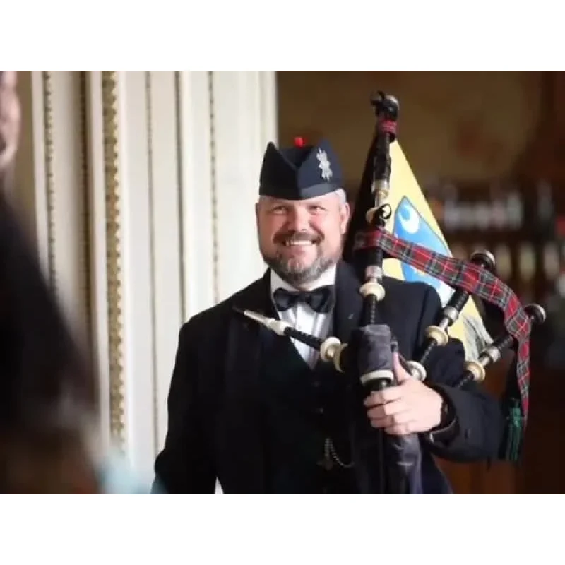 Andrew Paton Highland Bagpiper Logo