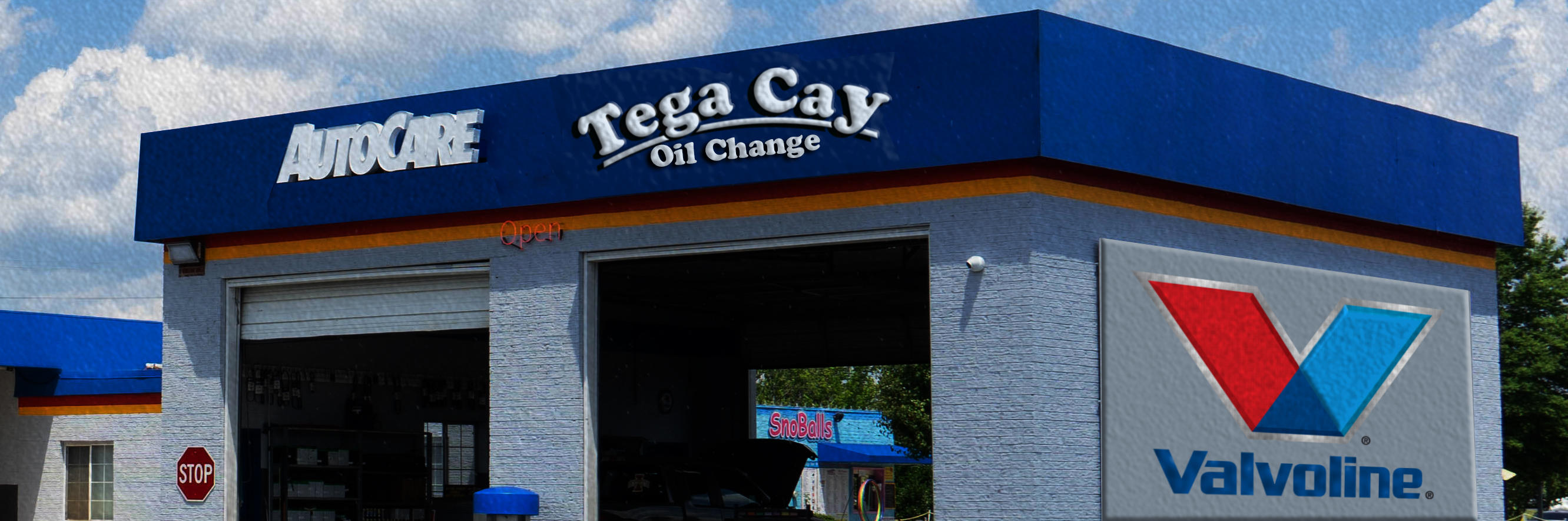 Fort Mill location: Capture the essence of Tega Cay Oil Change, your trusted auto service shop in Fort Mill, SC. This picture showcases our commitment to excellence as we proudly pour Valvoline oil during our top-notch auto repair services. From brake replacement to brake repair and AC repair, our skilled technicians deliver exceptional service and quality craftsmanship. Trust Tega Cay Oil Change for all your automotive needs.