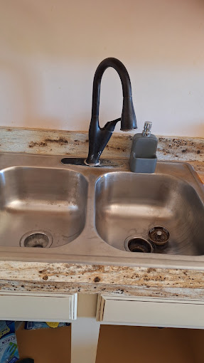 Plaza Home Repair Logo