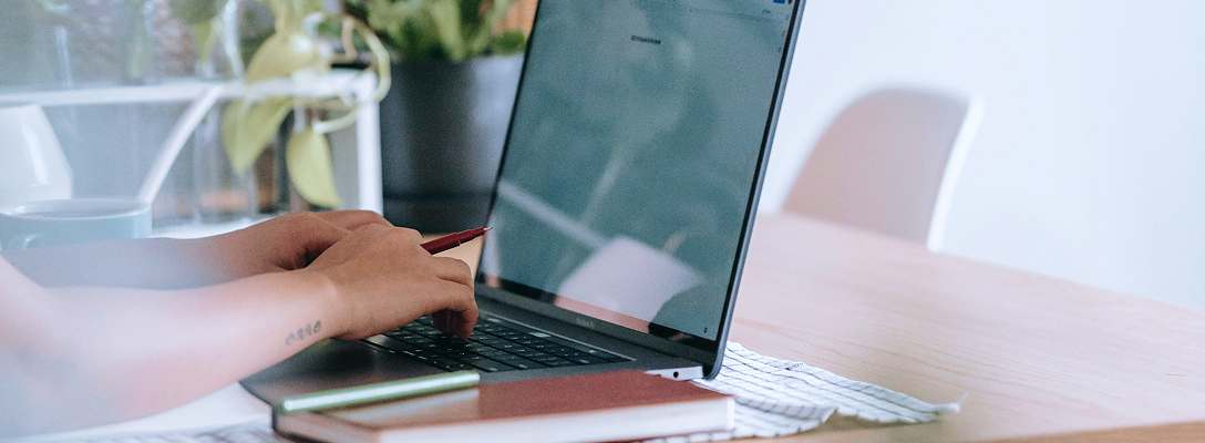 A client visiting WM Online on their laptop.