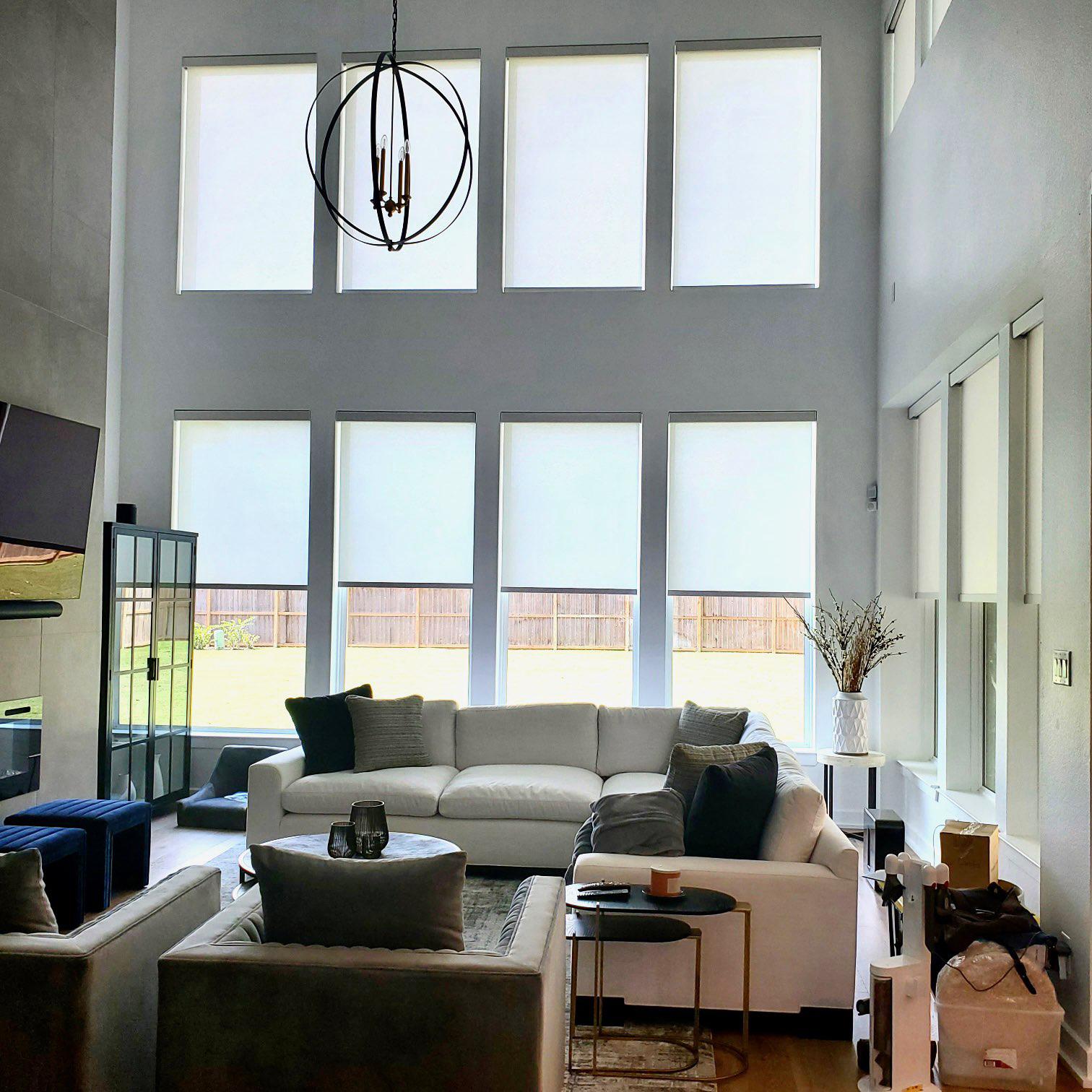 Do you have sky-high windows like this Sugar Land home? The sky is the limit with our Roller Shades! You can even have them automated—no need for a ladder!