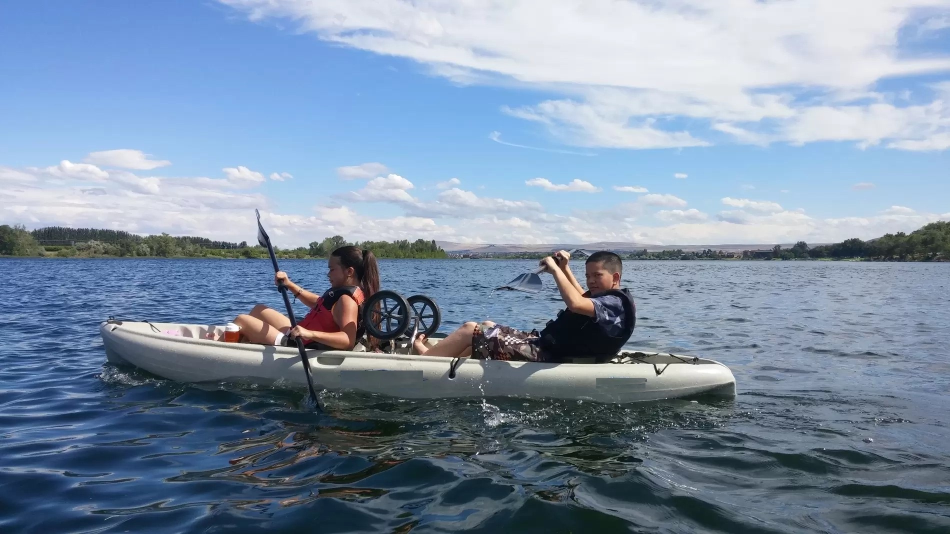 Ethan & Natalie enjoying some kayaking... actually I'm pretty sure they were arguing.  The life of siblings.  Love our kids!