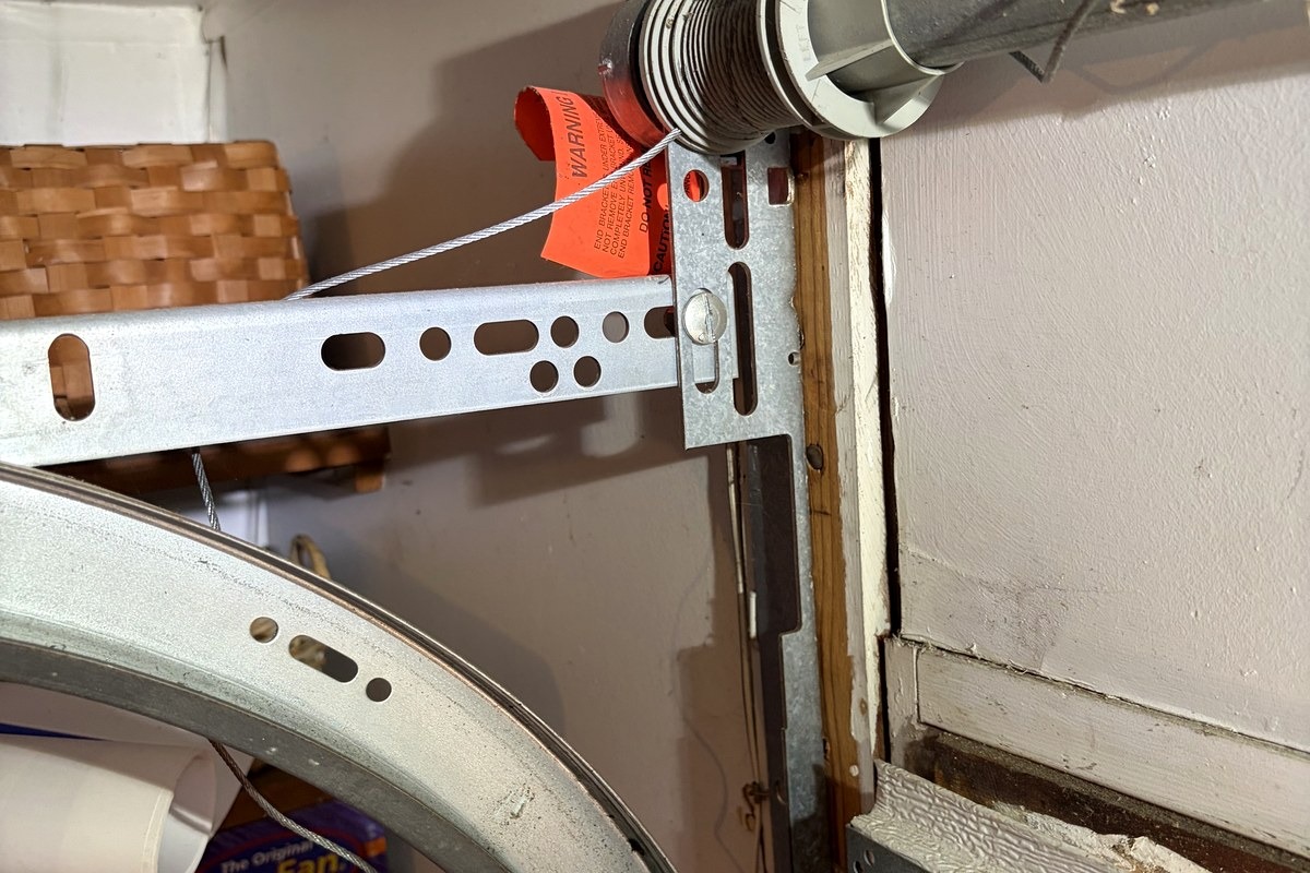 Garage door lift cable and cable drum detail from a Garage Fixer residential inspection. 