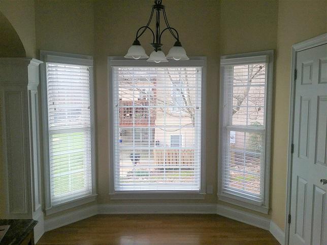 Faux Wood Blinds by Budget Blinds of Knoxville & Maryville make it easy to switch from full light to Budget Blinds of Knoxville & Maryville Knoxville (865)588-3377