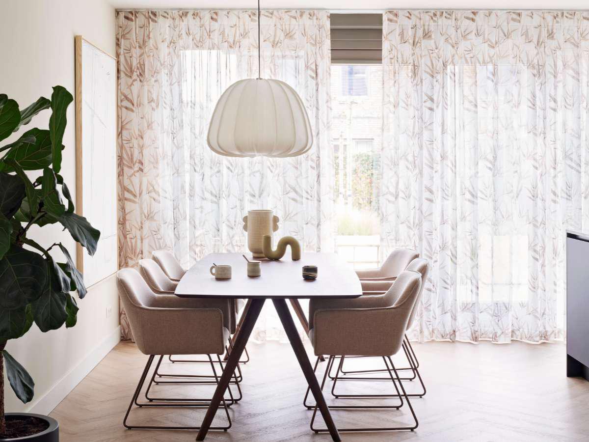 Layer curtains or drapes over window blinds, window shades or shutters for additional energy-saving insulation and light control. Exclusive designer fabrics, imported from Italy, are available for creating that special ambiance that says, “wow”!