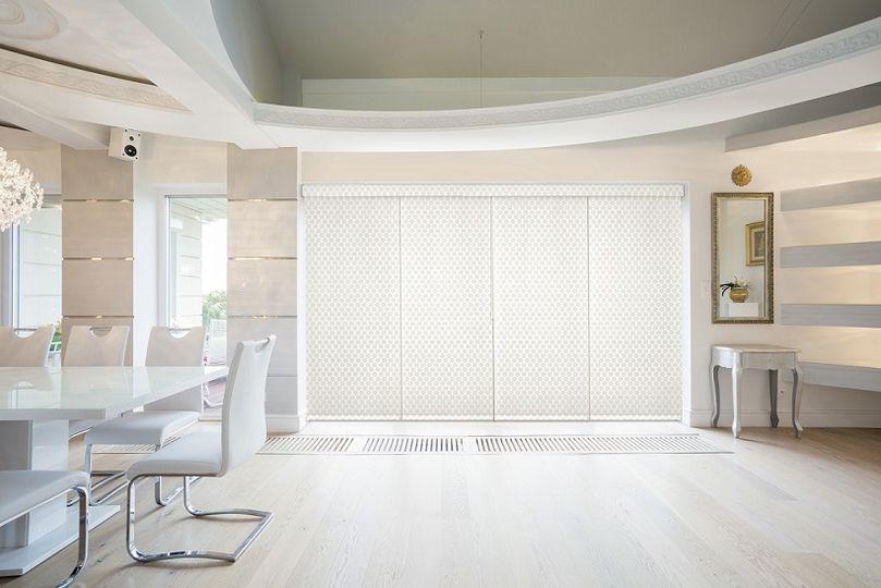 Sliding Panels by Budget Blinds of Kennesaw & Acworth stack neatly to the right or left, allowing easy access to a sliding glass door and are an ideal alternative if you aren't in love with the look of traditional vertical blinds. Endless color & pattern options bring the look you want to your home