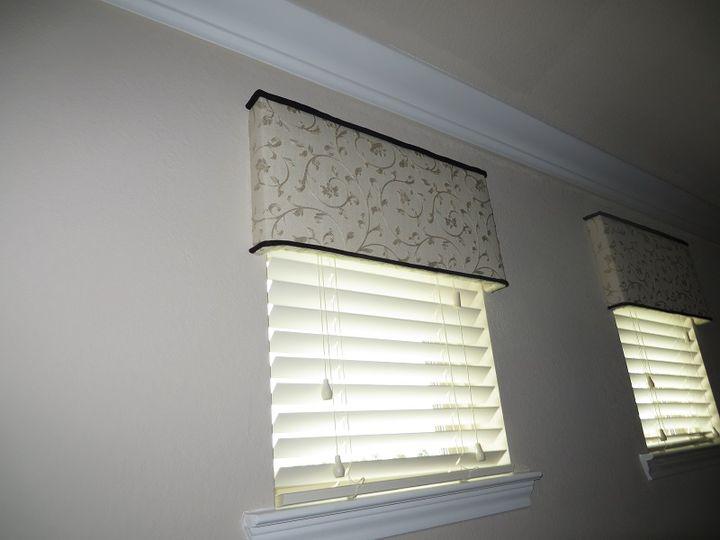 Look at how these gorgeous Wood Blinds and Fabric Wrapped Cornices in this Katy, TX, home have given a beautiful and elegant window transformation. #BudgetBlindsKatySugarLand #WoodBlinds #CustomCornices #KatyTX #FreeConsultation