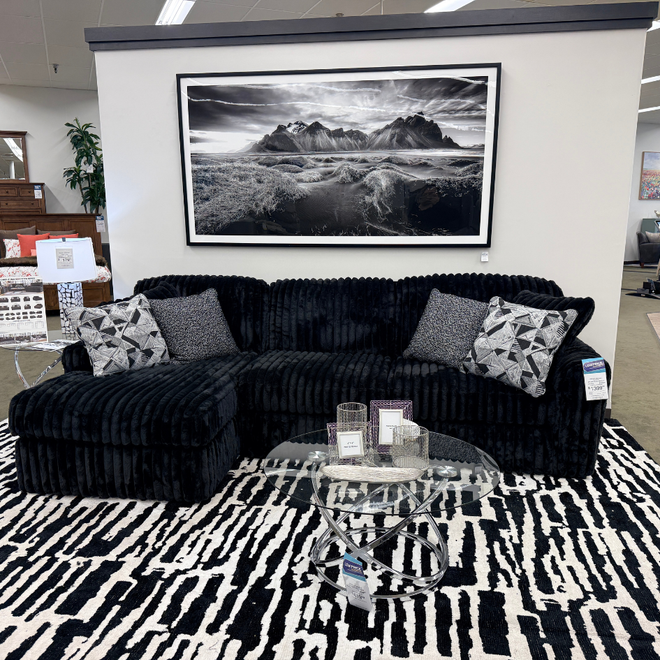 Make a statement with the Midnight Madness Sectional at Slumberland Furniture Burlington. With its bold black upholstery, plush texture and spacious chaise design, this sectional brings dramatic style and comfortable seating to your living room.