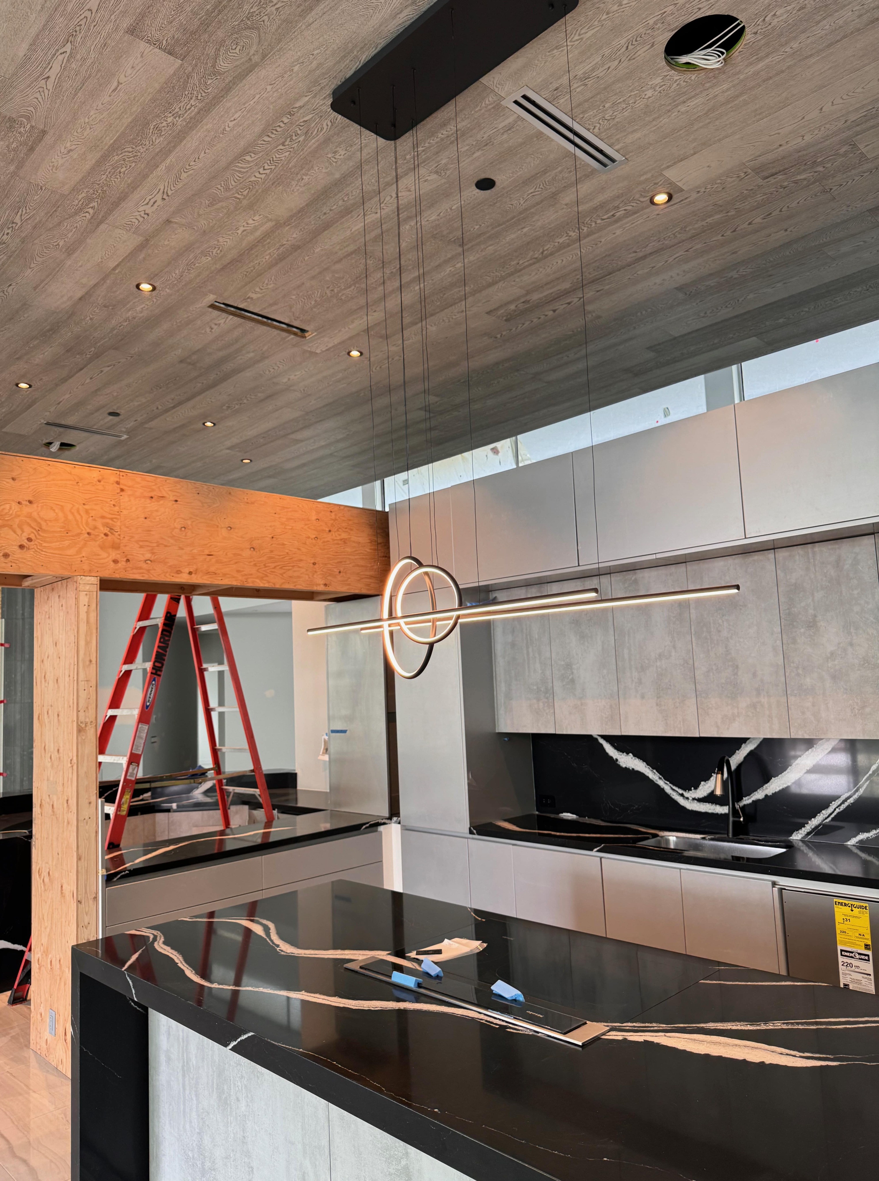 Professional installation of energy-efficient lighting and electrical systems for a modern commercial workspace. Our expertise in designing and wiring for office renovations ensures optimal power distribution and functionality for business environments.