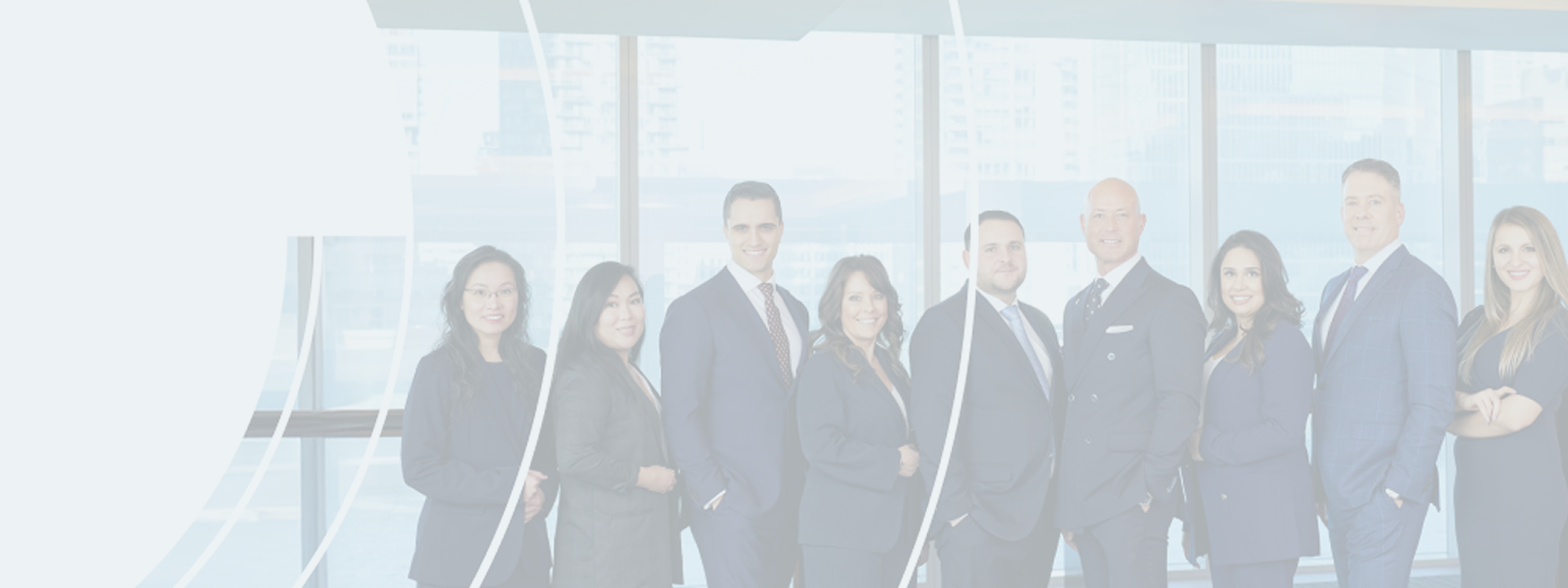 Mainella Private Wealth team standing side by side.