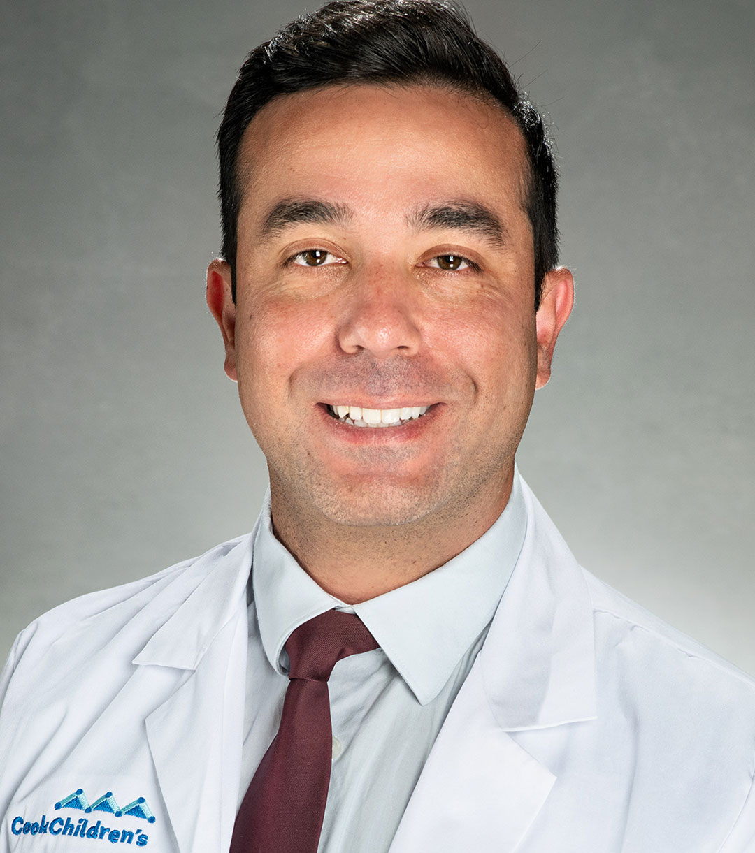 Headshot of Dr. Alexander Alali