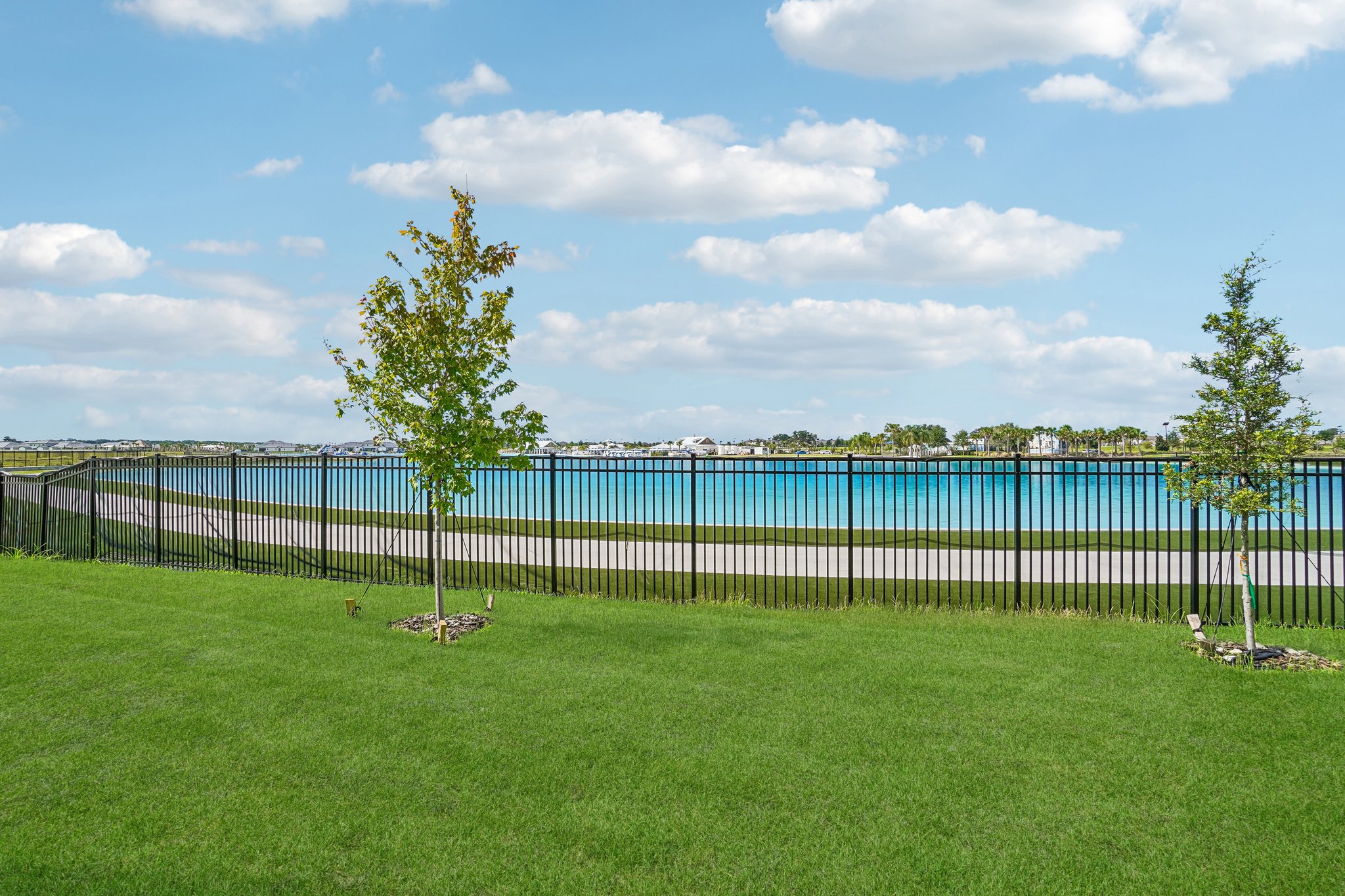 The Backyard Facing the Mirada Lagoon of a DRB Homes Quick Move-In Home in San Antonio, FL. 